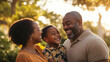 © Immersive Dimension - Afro-American Family Smiling and Laughing Together Outdoors. Happy Family Laughing Together Outdoors