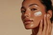 © Rawpixel.com - Indigenous woman applying cream face skin skincare.