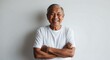 © Arceli - southeast asian elderly man white background wearing plain white tshirt smiling happy portrait