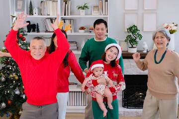 Wall Mural - Young woman celebrates Christmas with family.