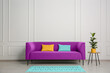 © New Africa - Stylish magenta color sofa, pillows and table near white wall indoors