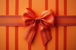 © RafaelDavid - A Beautifully Wrapped Orange Gift Adorned With an Elegant Ribbon Sits Against a Vivid Background