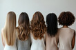 © expressiovisual - A group of women with different hair types and styles stand side by side