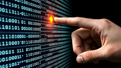 Digital Fingerprint: A hand points to a glowing red digit on a screen filled with binary code, symbolizing the power and potential of data in a technological landscape.