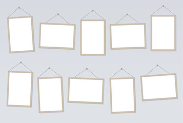 Wall Mural - Set of 10 photo frames hanging on ropes. Horizontal and vertical A-4 pictures. Empty Mockup for photos, cards, exhibition, presentation. Blank Vector templates. EPS10. 