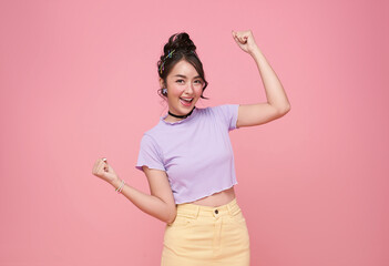 Young Asia cute girl feel happy with positive expression, joyful surprise laugh, dressed in casual cloth isolated on pink background.