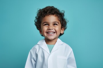 Sticker - Photo of a child wearing lab gown smiling.