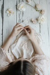 Wall Mural - A person lying down next to fresh flowers, a quiet moment of relaxation