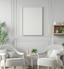 Mockup of a white framed poster hanging on a white wall in a minimalist living room Two white armchairs with pillows sit on a wood floor. a round wood table with a vase and a book sits