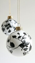 Elegant black and white decorative ornaments hanging for festive celebrations during winter season