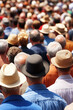 © Konstiantyn Zapylaie - Diverse crowd of elderly people wearing hats in outdoor gathering