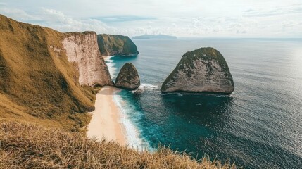 Wall Mural - A breathtaking view of an island surrounded by clear blue waters, with rocky cliffs and sandy beaches, under a sunny sky.