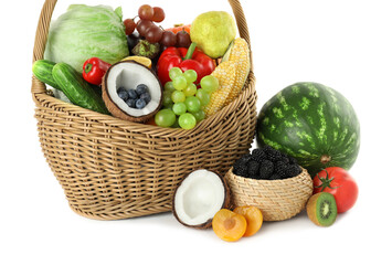 Canvas Print - Wicker basket with different fresh vegetables and fruits isolated on white