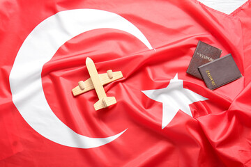 Flag of Turkey with airplane and passports