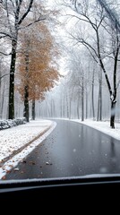 Aufkleber - A winter morning reveals a snowy road stretching through a serene countryside landscape. Soft light illuminates the horizon, enhancing the chill of the season