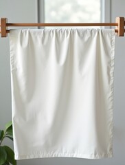 close up white sheet drying line