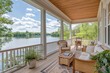 © Aliaksandra - lakefront retreat, charming lakefront bungalow with calm water vistas inviting wraparound porch for tranquil relaxation