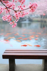 Canvas Print - A serene view of cherry blossoms over a pond with colorful koi fish.