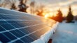 © LifeMedia - A stunning view of solar panels lightly covered with snow as the sun sets, highlighting the balance of technology and nature during a cold winter season.
