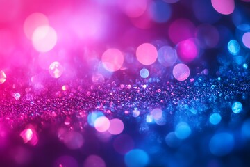 Abstract pink and blue bokeh lights with glitter texture.