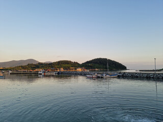 Wall Mural - 
This is a view of an island village at sunset.