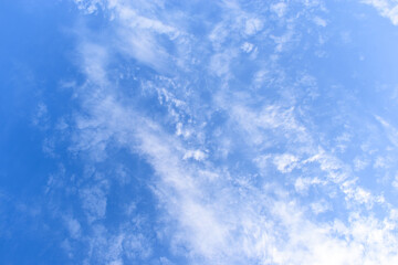 Wall Mural - beautiful blue sky and white fluffy group of clouds with sunrise in the morning, natural background