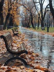 Aufkleber - Pathways through a peaceful urban park are covered in vibrant fallen leaves with benches lining the walkway on a rainy day. Generative AI