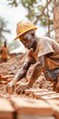 © KerXing - Construction Worker Laying Bricks at a Building Site