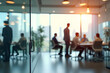 © Amir Bajric - Business office with blurred people casual wear, with blurred bokeh background