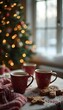 © Photo by mQ - A warm holiday scene featuring a cozy table set with mugs of hot chocolate and gingerbread, complemented by a large Christmas tree in the background. Text can be added on the snowy windowsill.