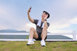 © Prathankarnpap - Happy runner taking a selfie with smartphone after successful workout. Fitness and healthy lifestyle concept