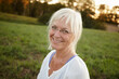 © Laflor/peopleimages.com - Smile, happy and portrait of senior woman with confidence for retirement, vacation and outdoor exploring. Nature, mature person and relax in New York park for holiday, tourism and health or wellness