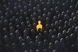 © kenkuza - The yellow figure stands out from crowd concept