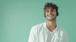© Fathor - Young smiling happy satisfied man wear shirt white t-shirt casual clothes listen to music in headphones use mobile cell phone isolated on plain blue cyan background studio portrait. generative ai