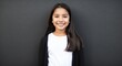 © Arceli - hispanic latino teen girl black background wearing plain white tshirt smiling happy portrait