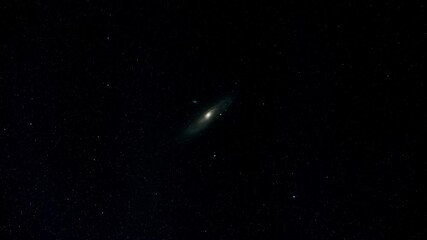Wall Mural - a zoom in on the andromeda galaxy in deep space