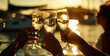 © Людмила Мазур - Three people are toasting with champagne glasses on a boat. The sun is setting, creating a warm and relaxed atmosphere