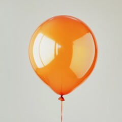 Wall Mural - a close-up of a shiny orange balloon, floating lightly against a clean white background, showcasing 