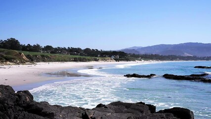 Wall Mural - Waves crashing on beach of Carmel by the sea, California 