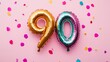 © Denys - Number ninety shaped balloons celebrating ninetieth birthday party on pink background
