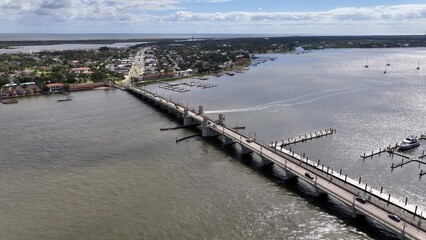 St Augustine Florida aerial view of historic Bridge Of Lions crossing inlet waterway with cars traveling 