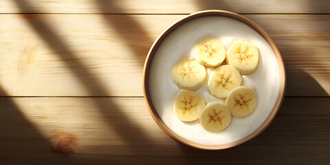 Fresh Sliced Bananas on a Plate with Sunlight