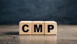 © hardvicore - Wood cubes with abbreviation text CMP on wooden table. Certified Meeting Professional.