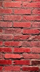 old brick wall background. Flat brickwork of bright red color. Cement mortar in the color of a brick. The brick is in good condition, not broken, there are shadows, small dents, monocolor