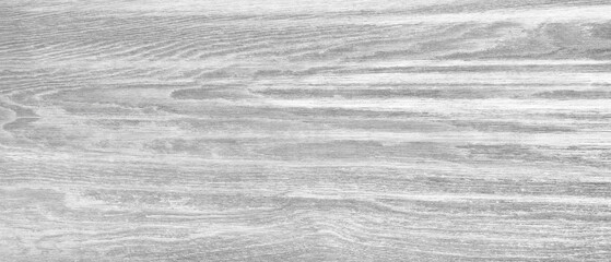 Poster - A wooden surface with a grainy texture. The wood is white and he is unfinished. The surface is smooth and has a natural look to it