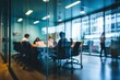 © melhak - A blurry an office with people working in the background - Backgrounds