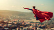 © Kondor83 - Superhero flying over a city