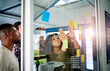 © Donson/peopleimages.com - Group, business people and diversity in presentation with sticky notes, collaboration or creativity. Team, meeting and planning in digital agency, company or office for ideas, brainstorming or vision