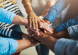 © Donson/peopleimages.com - Hands, team and stack at office for support, solidarity or goal with connection at media company. Business people, group and above circle for synergy, link or cheers for motivation at creative agency