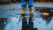 © Gibster - child splashing in puddle, water droplets frozen in mid air, evokes joy